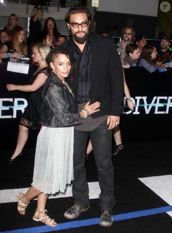 Lisa Bonet et son mari Jason Momoa lors de la première du film "Divergent" au Regency Bruin Theatre à Los Angeles, le 18 mars 2014.