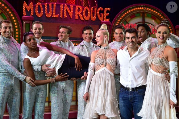 Exclusif - Marie-José Pérec avec des artistes du Moulin Rouge et de son compagnon Sébastien Foucras à Paris le 21 juillet 2015.