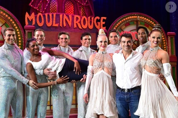 Exclusif - Marie-José Pérec aux côtés des artistes du Moulin Rouge et de son compagnon Sébastien Foucras à Paris le 21 juillet 2015.