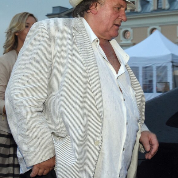 French actor Gerard Depardieu (L) leaves a presentation on the FIFA World Cup 2018 in Russia by the Russian city of Saransk in St. Petersburg, Russia, 23 July 2015. Depardieu received a Russian passport from Russian president Putin in 2013 and owns an apartment in Saransk. Photo by Marcus Brandt/DPA/ABACAPRESS.COM24/07/2015 - St. Petersburg