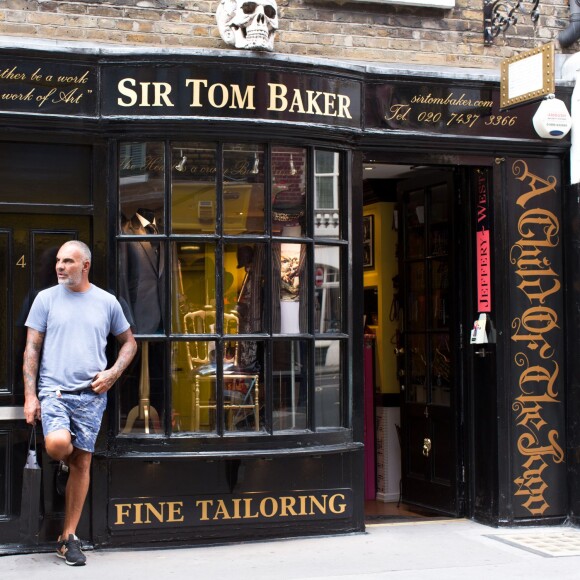 Exclusif - Christian Audigier et sa fiancee Nathalie Sorensen profitent d'un sejour romantique a Londres, le 5 aout 2013. Le couple a visite la ville avant d'aller faire du shopping.