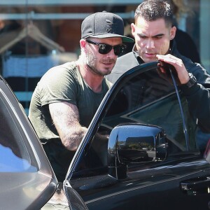 David Beckham sort de son cours de gym à Los Angeles Le 25 Juillet 2015  51808230 Soccer legend David Beckham starts his morning off with a trip to Soul Cycle gym for a workout on July 25, 2015 in Brentwood, California. David got a new tattoo of the number 99 on his hand last week to celebrate his 16th anniversary to Victoria...25/07/2015 - Los Angeles