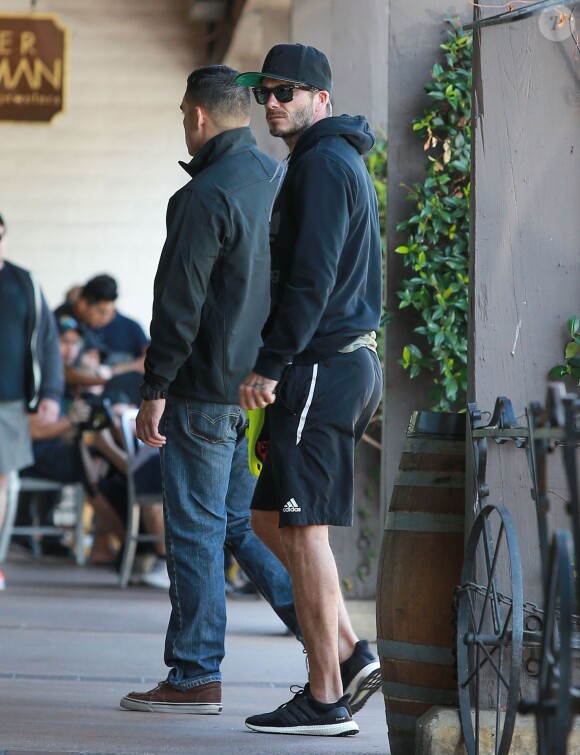 David Beckham sort de son cours de gym à Los Angeles Le 25 Juillet 2015  51808230 Soccer legend David Beckham starts his morning off with a trip to Soul Cycle gym for a workout on July 25, 2015 in Brentwood, California. David got a new tattoo of the number 99 on his hand last week to celebrate his 16th anniversary to Victoria...25/07/2015 - Los Angeles