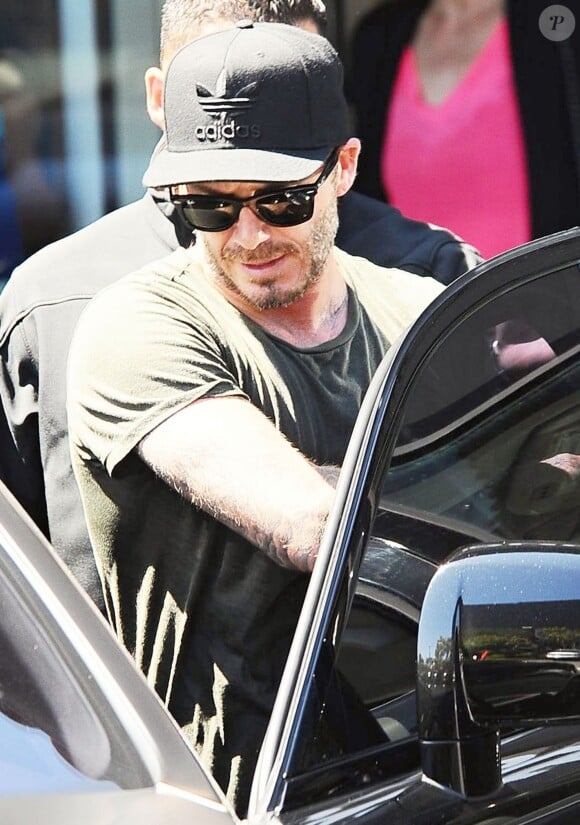 David Beckham sort de son cours de gym à Los Angeles Le 25 Juillet 2015  51808230 Soccer legend David Beckham starts his morning off with a trip to Soul Cycle gym for a workout on July 25, 2015 in Brentwood, California. David got a new tattoo of the number 99 on his hand last week to celebrate his 16th anniversary to Victoria...25/07/2015 - Los Angeles