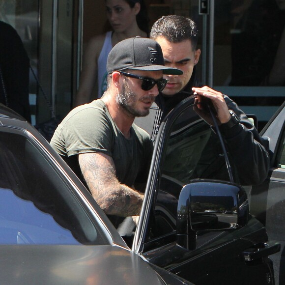 David Beckham sort de son cours de gym à Los Angeles Le 25 Juillet 2015  51808230 Soccer legend David Beckham starts his morning off with a trip to Soul Cycle gym for a workout on July 25, 2015 in Brentwood, California. David got a new tattoo of the number 99 on his hand last week to celebrate his 16th anniversary to Victoria...25/07/2015 - Los Angeles