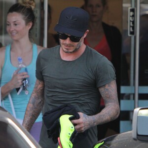 David Beckham sort de son cours de gym à Los Angeles Le 25 Juillet 2015  51808230 Soccer legend David Beckham starts his morning off with a trip to Soul Cycle gym for a workout on July 25, 2015 in Brentwood, California. David got a new tattoo of the number 99 on his hand last week to celebrate his 16th anniversary to Victoria...25/07/2015 - Los Angeles