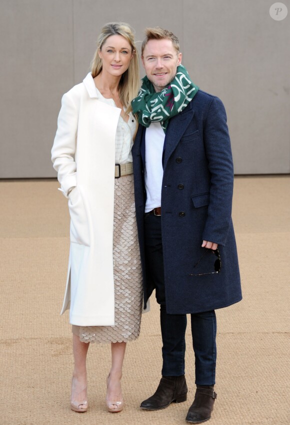 Ronan Keating and Storm Uechtriz arrive au défilé Automne/Hiver 2015 "Burberry Prorsum" à Kensington Gardens lors de Fashion Week à Londres, le 23 février 2015  