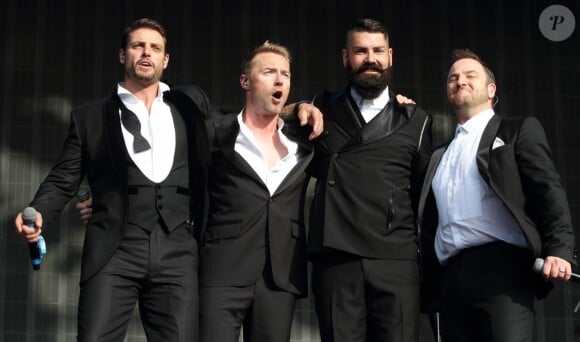 Keith Duffy, Ronan Keating, Shane Lynch et Mikey Graham du groupe Boyzone lors du British Summer Time Festival au Hyde Park à Londres, le 13 juillet 2014. 
