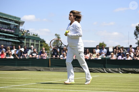 Amélie Mauresmo, enceinte, à Wimbledon le 9 juillet 2015. La championne française a accouché le 16 août 2015 de son premier enfant.