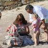 Exclusive - Carla, Nicolas Sarkozy et leur fille Giulia sur la plage du Cap Nègre le 14 juillet 2014.