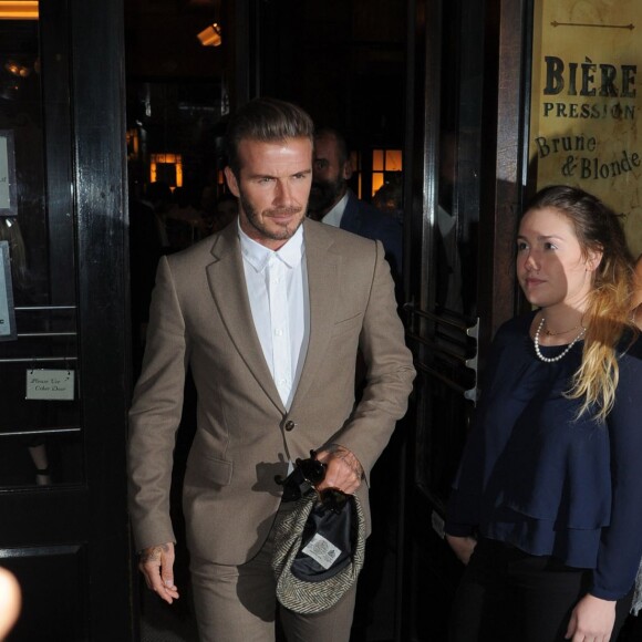 Victoria Beckham, David et Brooklyn déjeunent au restaurant Balthazar à New York, le 13 septembre 2015.