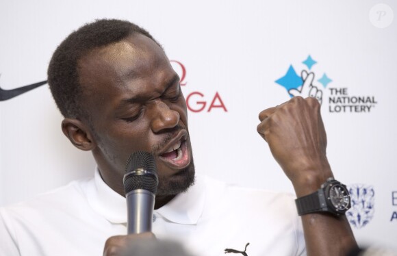 Usain Bolt lors d'une conférence de presse au Grange Tower Bridge Hotel de Londres, le 23 juillet 2015