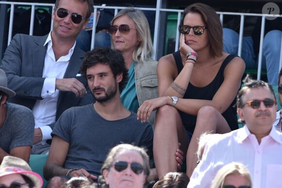Laure Manaudou et son compagnon Jérémy Frérot dans les tribunes de Roland-Garros lors de la finale des Internationaux de France à Paris, le 7 juin 2015