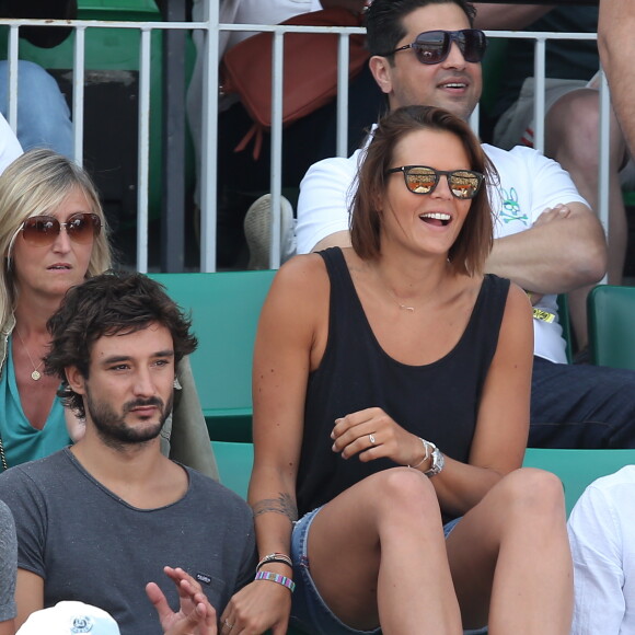 Laure Manaudou et son compagnon Jérémy Frérot dans les tribunes de Roland-Garros lors de la finale des Internationaux de France à Paris, le 7 juin 2015