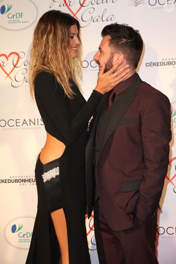 Michaël Youn et sa compagne Isabelle Funaro - Personnalités au gala "Par Coeur" pour les 10 ans de l'association "Cekedubonheur" au pavillon d'Armenonville à Paris. Le 24 septembre 2015