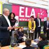 Le petit garçon Joris, Najat Vallaud-Belkacem et Zinédine Zidane, parrain de l'association lors de la dictée ELA à l'école Marseille à Paris, le 12 octobre 2015, pour le lancement de la campagne nationale contre la maladie et le handicap de l'association européenne contre les leucodystrophies (ELA)