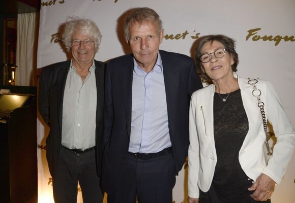 Jean-Jacques Annaud avec sa femme Laurence et Patrick Poivre d'Arvor - Soirée "Stars et Saveurs" à l'occasion de la nouvelle carte élaborée par le chef Pierre Gagnaire au Fouquet's à Paris le 12 octobre 2015.