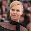 Charlize Theron (robe Valentino) - Photocall du film "Mad Max: Fury Road" lors du 68e festival international du film de Cannes le 14 mai 2015.