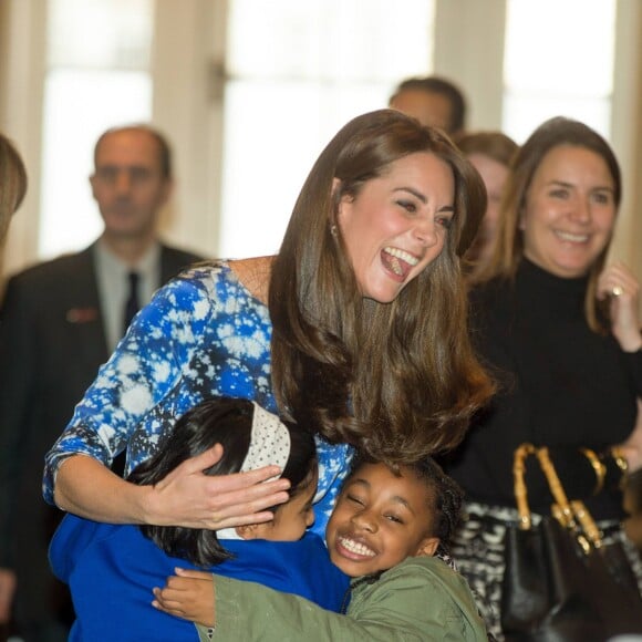 Kate Middleton, duchesse de Cambridge, le prince William et le prince Harry se sont bien amusés, le 26 octobre 2015 au siège de la BAFTA, lors d'une rencontre avec des enfants dans le cadre de The Charities Forum, un événement rassemblant une trentaine d'associations qu'ils soutiennent.