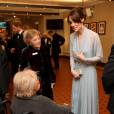 La duchesse Catherine de Cambridge, habillée d'une robe Jenny Packham, le prince William et le prince Harry assistaient le 26 octobre 2015 à l'avant-première de Spectre, le nouveau James Bond, en présence de l'équipe du film, notamment Daniel Craig, Léa Seydoux et Monica Bellucci.