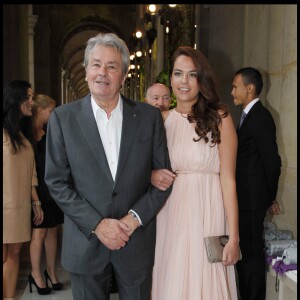 Alain Delon et sa fille Anouchka - Défilé de la collection Salvatore Ferragamo le 12 juin 2012 à Paris