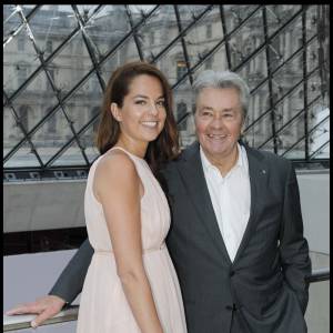 Alain Delon et sa fille Anouchka - Défilé de la collection Salvatore Ferragamo le 12 juin 2012 à Paris
