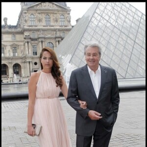 Alain Delon et sa fille Anouchka - Défilé de la collection Salvatore Ferragamo le 12 juin 2012 à Paris