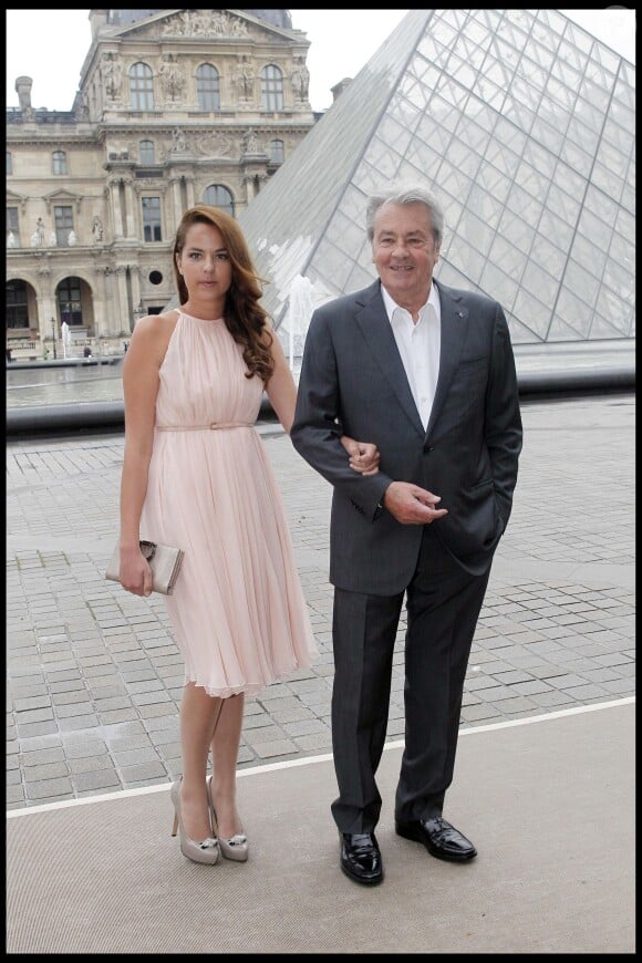 Alain Delon et sa fille Anouchka - Défilé de la collection Salvatore Ferragamo le 12 juin 2012 à Paris