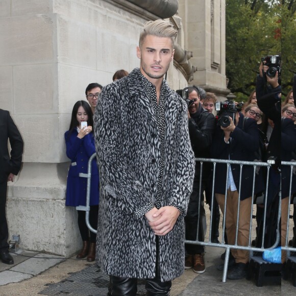 Baptiste Giabiconi (Skatecycle électrique) - Sorties du défilé de mode "Chanel", collection prêt-à-porter printemps-été 2016, à Paris. Le 6 octobre 2015