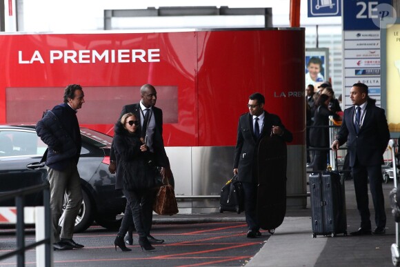 Exclusif - Olivier Sarkozy et sa fiancée Mary-Kate Olsen arrivent pour prendre un avion pour New York à l'aéroport de Paris-Charles-de-Gaulle à Roissy-en-France, le 10 janvier 2015.