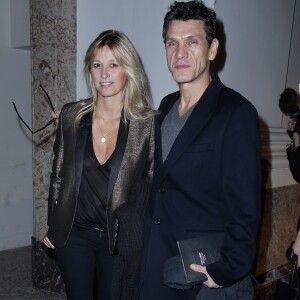 Marc Lavoine et sa femme Sarah Poniatowski Presentation de la collection Homme Yves Saint Laurent au Grand Palais, à Paris le 20 janvier 2013