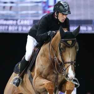 Guillaume Canet sur Sweet Boy d'Alpa lors du Longines Masters de Paris, le 4 décembre 2015, à Villepinte © Christophe Bricot