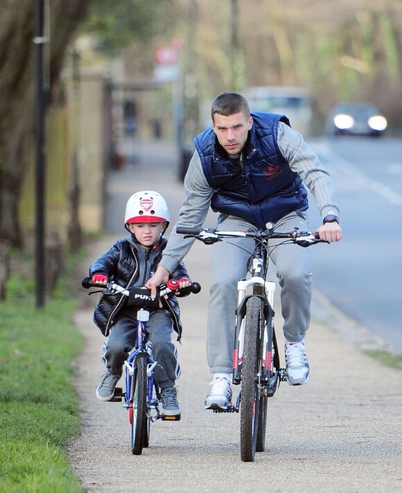 Lukas Podolski et son fils Louis Podolski à Londres en février 2014.