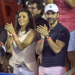 Exclusif -  Eva Longoria et son compagnon Jose Antonio Baston dans les tribunes d'un match de tennis pendant l'Open du Mexique à Acapulco, le 28 février 2015.