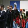 Exclusif - Johnny Hallyday et sa fille Joy - La famille Hallyday arrive à l'aéroport de Roissy pour prendre un vol pour aller passer leurs vacances en Thaïlande avec des amis le 19 décembre 2015.
