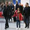 Exclusif - Johnny Hallyday et ses filles Jade et Joy - La famille Hallyday arrive à l'aéroport de Roissy pour prendre un vol pour aller passer leurs vacances en Thaïlande avec des amis le 19 décembre 2015.