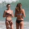 Katie Cassidy et une amie sur la plage de Miami. Le 21 décembre 2015.