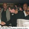 Alan Coriolan, entouré de Brahim Asloum et Eddy Mitchell, fêtant son 53e anniversaire au VIP Paris en mars 2001.
