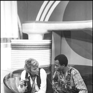 Johnny Hallyday et Alan Coriolan en mars 1981 sur le plateau d'une émission télé.