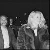 Johnny Hallyday, Alan Coriolan, Albert Minski et Catherine Deneuve en 1980 lors d'une soirée au 78 à Paris.