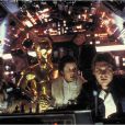 Peter Mayhew dans Star Wars : Episode V - L'Empire contre-attaque avec Harrison Ford et Carrie Fisher.