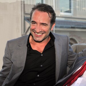 Exclusif - Jean Dujardin, Jean-Paul Belmondo - Soirée de Gala caritative au profit de l'association "Des Cantines Scolaires pour les Enfants du Sahel" à Cannes au Five Seas Hotel, le 31 mai 2014.