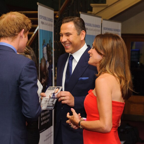 Le prince Harry, de dos, rencontre David Walliams et Natalie Pinkham au Royal Albert Hall à Londres le 8 juillet 2014, lors de la cérémonie des Business in the Community (BITC) 2014 Responsible Business Awards.