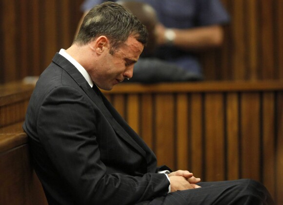 Oscar Pistorius en pleurs dans le box des accusés de la haute cour de Pretroia, le 11 septembre 2014