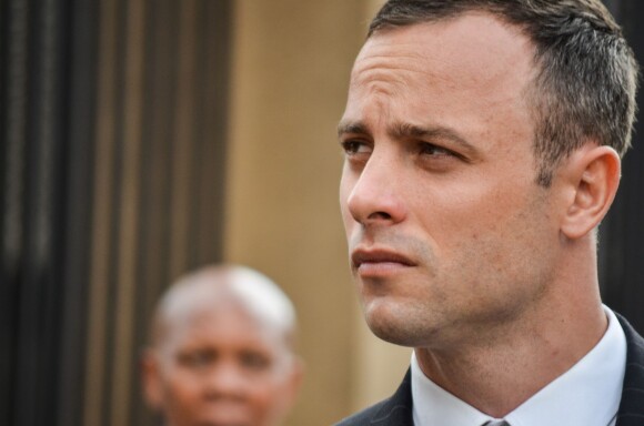 Oscar Pistorius lors de son arrivée devant la haute cour de justice de Pretoria le 28 mars 2014