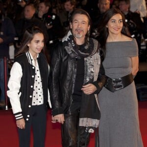 Florent Pagny, sa femme Azucena et leur fille Aël - 15e édition des NRJ Music Awards à Cannes. Le 14 decembre 2013.