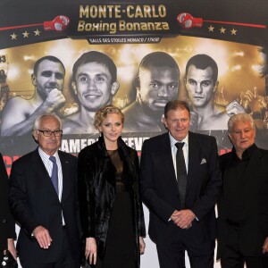 La princesse Charlene de Monaco et son pere Michael Wittstock au championnat du monde de boxe WBA/IBO entre Gennady Golovkin et Osumanu Adama, dans la salle des Etoiles au Sporting, à Monaco le 1er fevrier 2014.