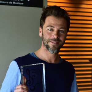 Christophe Maé, Grand Prix de l'UNAC 2015 pour la chanson "Tombé Sous Le Charme" lors de la remise du prix de l'UNAC 2015 à la Sacem à Paris, le 16 mars 2015.