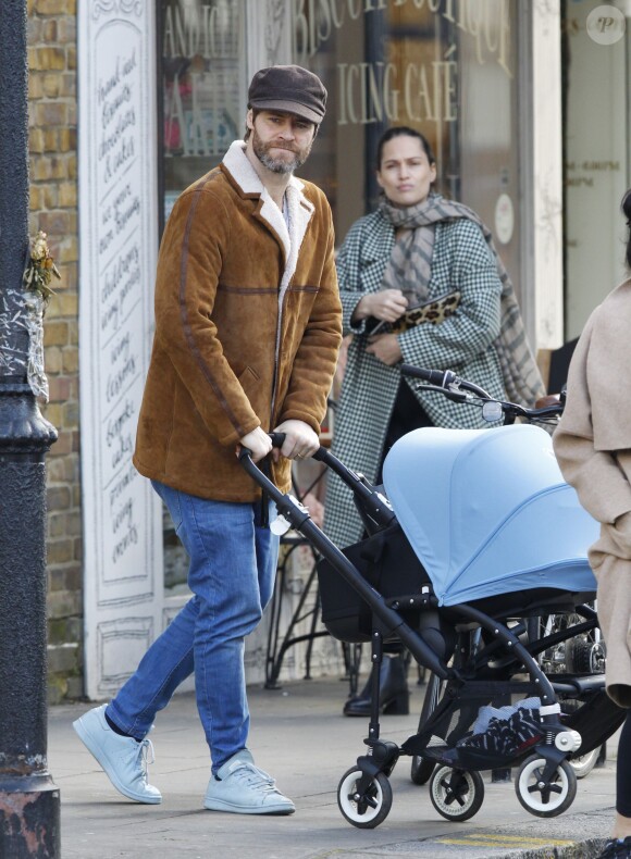 Exclusive - First pictures of singer Howard Donald's newborn son, Bowie Taylan Donald. The Take That star was seen alongside his wife Katie Halil as the couple took baby Bowie out for lunch with them in west London, England, UK on February 22, 2016. Howard appeared relaxed as he doted over his adorable son - who was born last month. Photo by ABACAPRESS.COM23/02/2016 - London