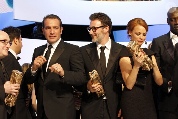 ean Dujardin, Bérénice Bejo et Michel Hazanavicius lors des César 2012
